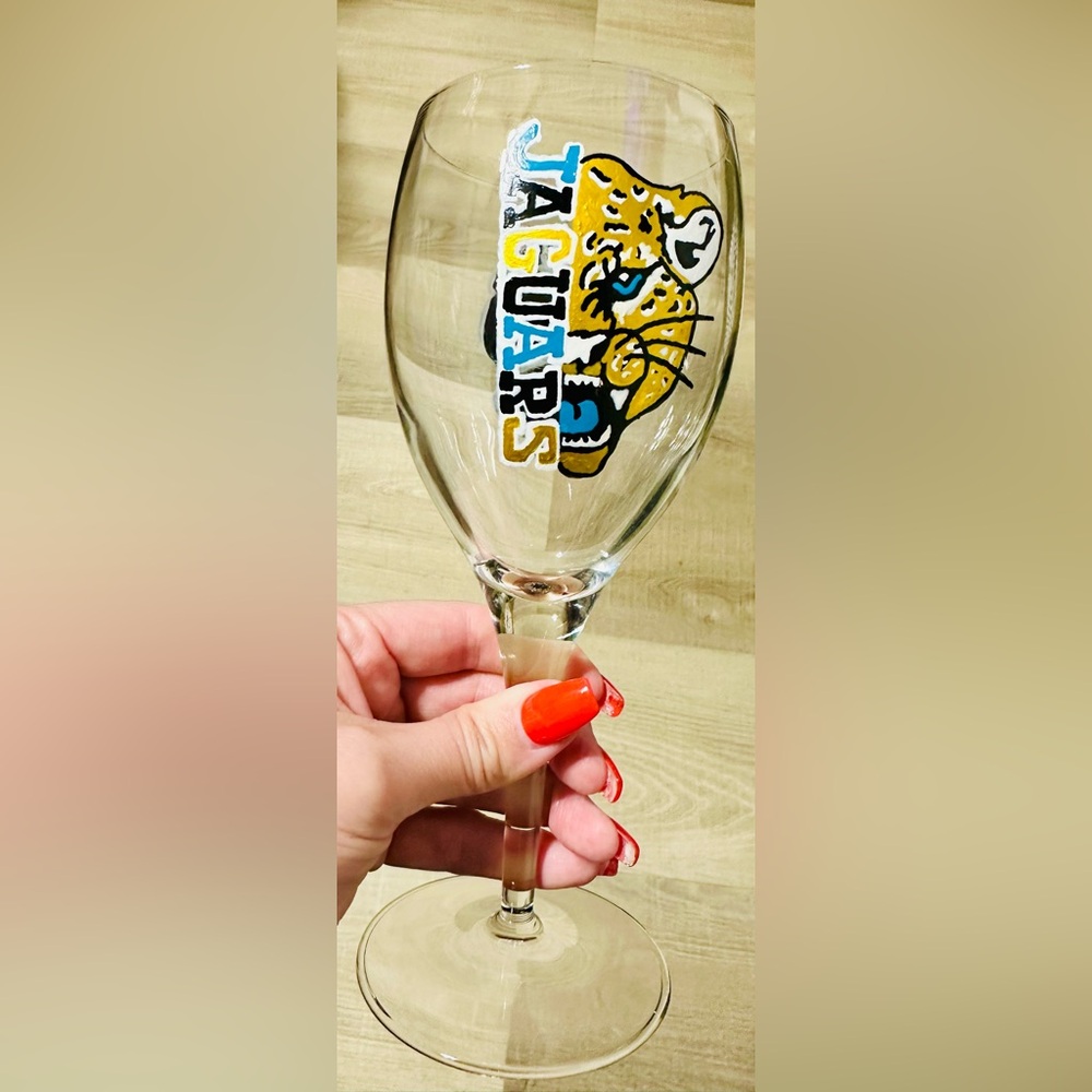 A Wine Glass I freelance painted of The Jacksonville Jaguars